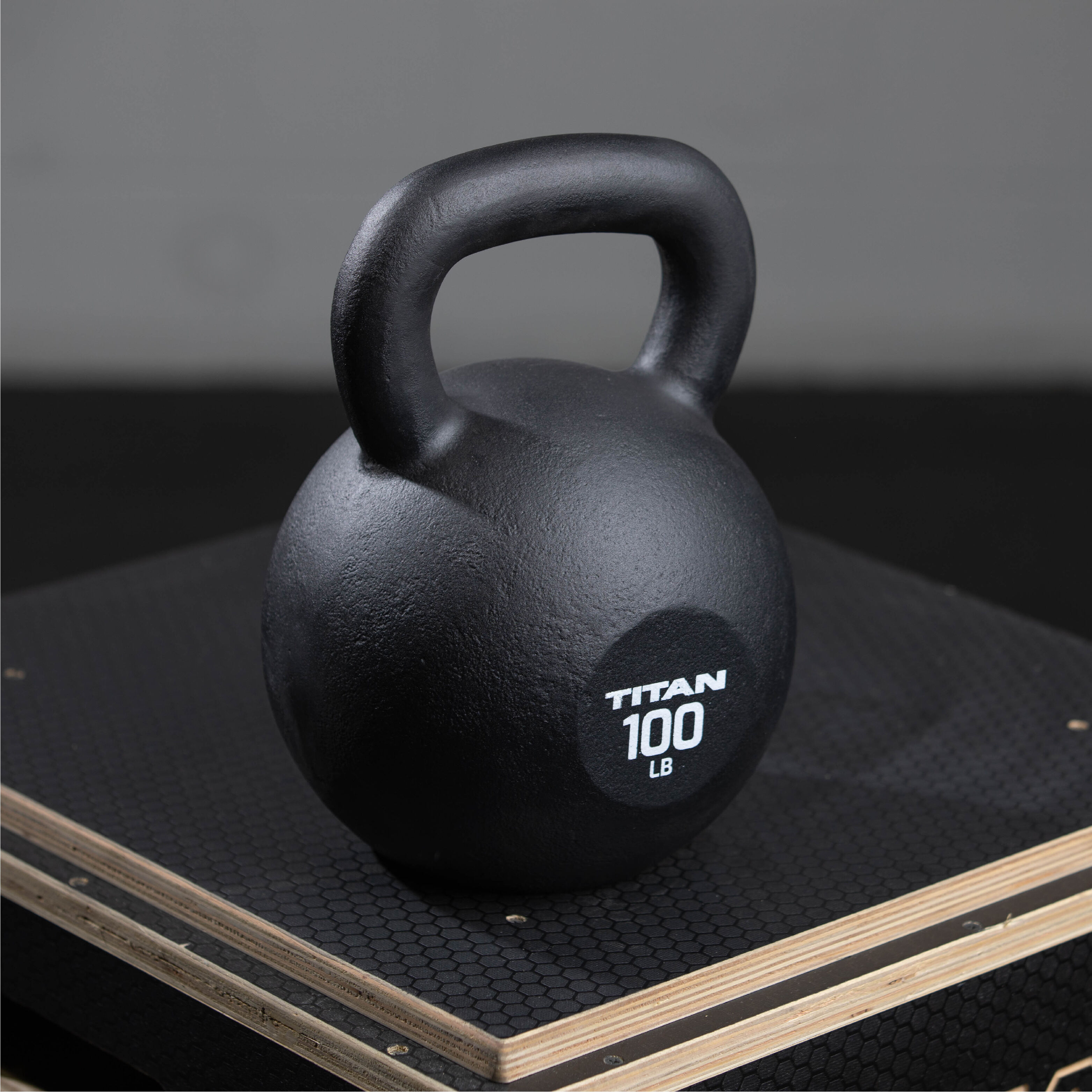 Titan Fitness 100 LB Cast Iron Kettlebell Single Piece Casting LB and KG 
