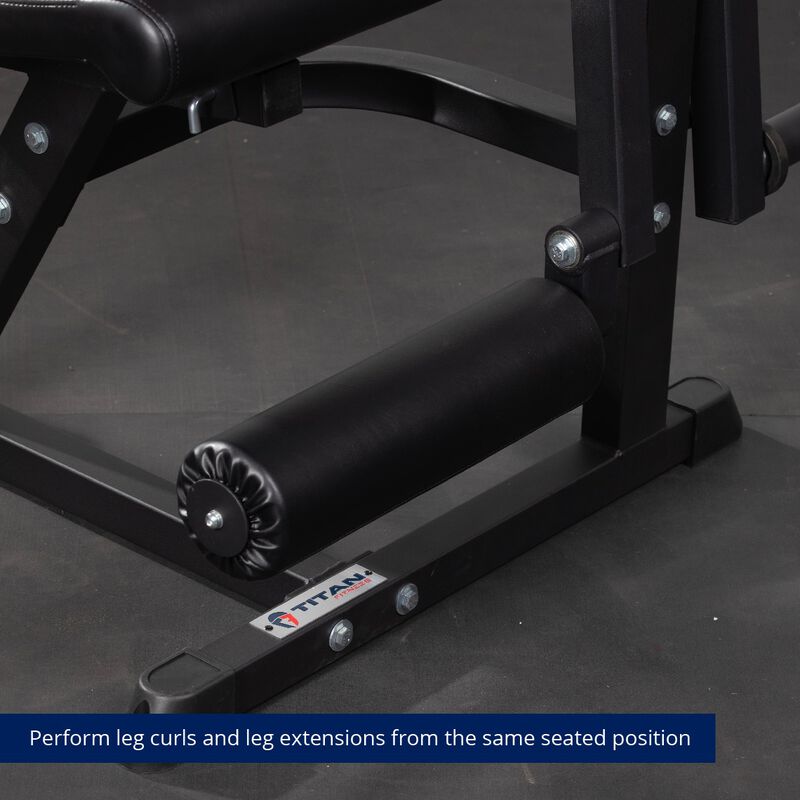 Perform leg curls and leg extensions from the same seated position